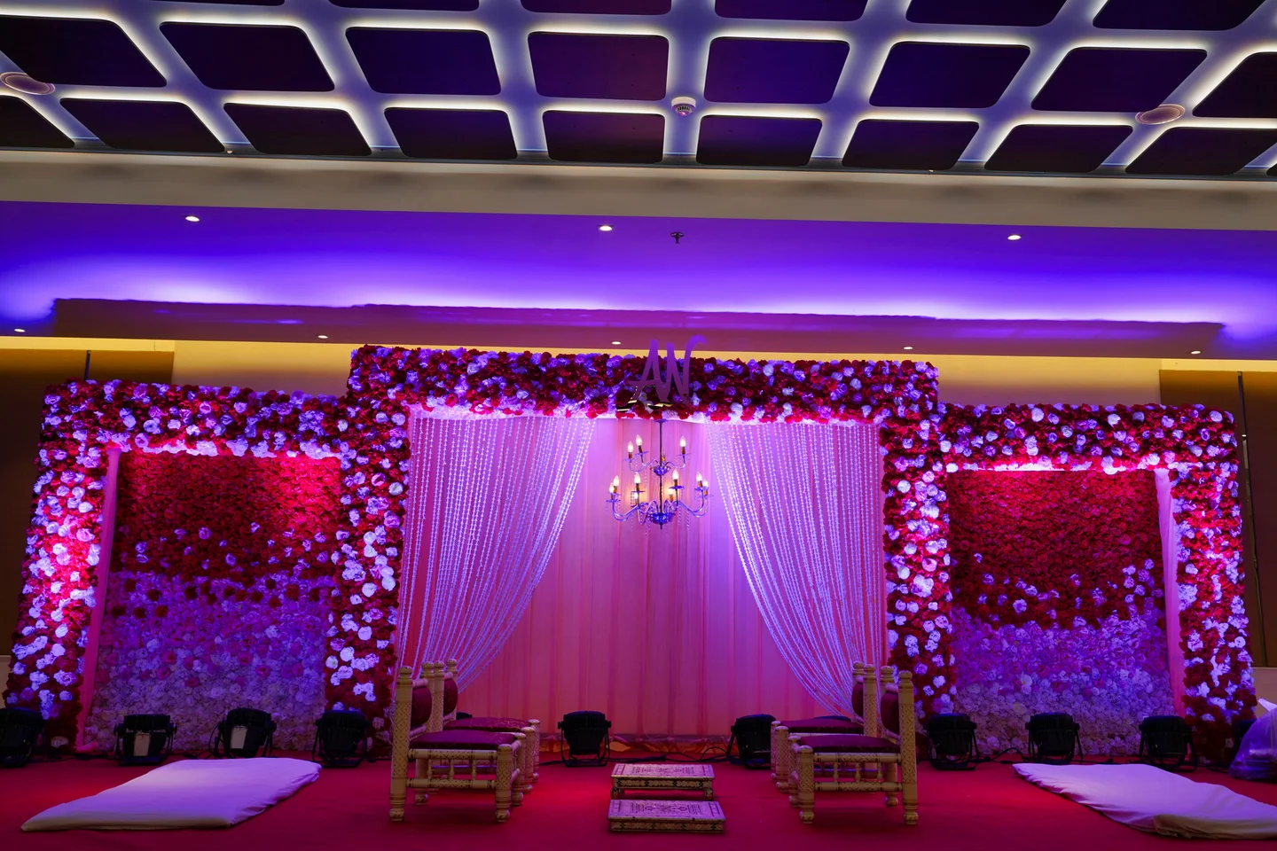 LaunchX 2026 event venue with attendees and stage lighting